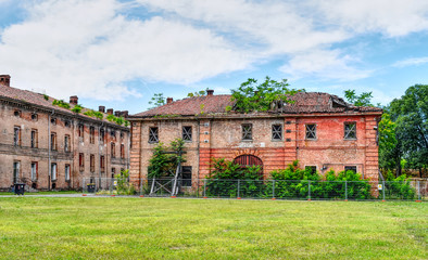 Abandoned and ruined buildings of the ancient damaged Cittadella of Alessandria in Italy. HDR...