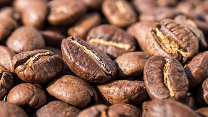Roasted coffee beans, backgrounde. Macro. Close-up