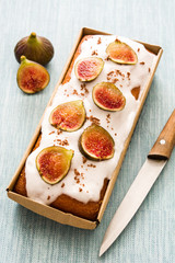 Delicious fig cake on blue background

