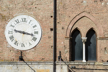 Detail of Salimbeni palace on Duomo square at Siena