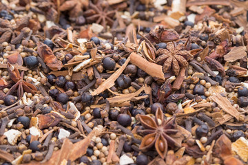 Spices and berries for hot wine brewing, vin brulè, close up view.