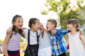 cheerful school age child play on playground school