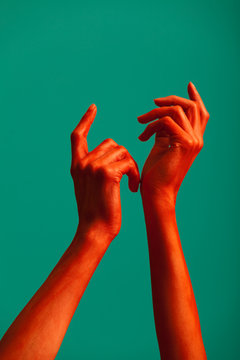 Red painted hands
