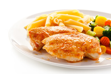 Fried chicken fillets with pasta