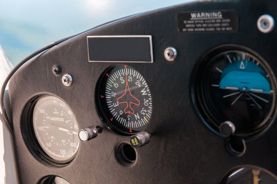 Dials and instruments on small airplane control panel