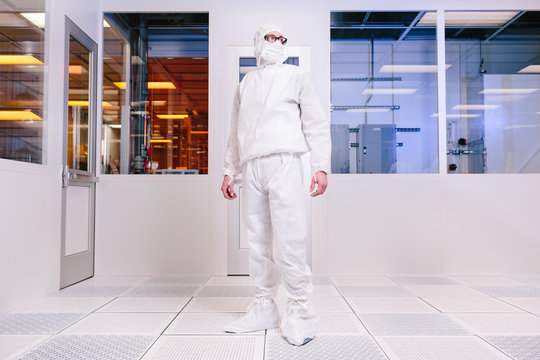scientist in empty clean room