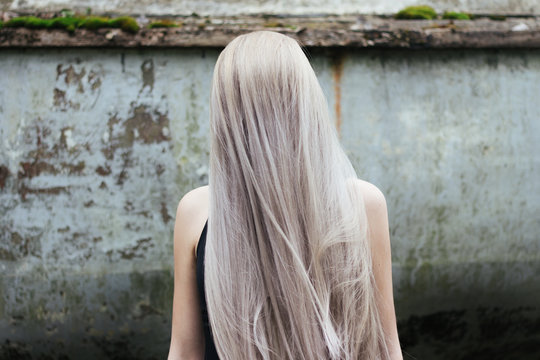 Anonymous female model with long pastel hair