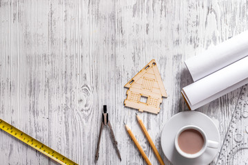 Architect workplace. Tools on light wooden desk top view copyspace