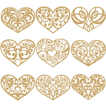Set of laser cut hearts. Collection of decorative gold hearts. Template for interior design, layouts wedding cards, invitations. Vector floral heart