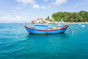 Fototapeta na wymiar The wood boat in Cu Lao Xanh island