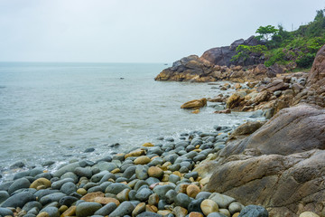 The coastilne with round rock