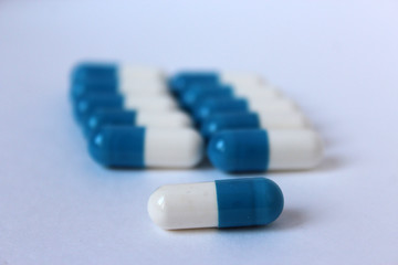 Tablet stand in rows of blue on white background isolate close-up plan