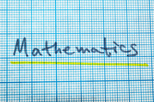 The word mathematics in a notebook for drawing.