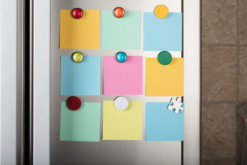Blank Notes Attached With Colorful Magnetic Thumbtacks