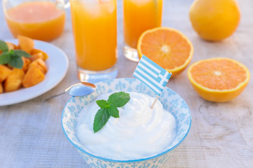 Healthy breakfast concept yogurt, fruits, fresh juice.