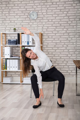 Female Manager Stretching Her Arms