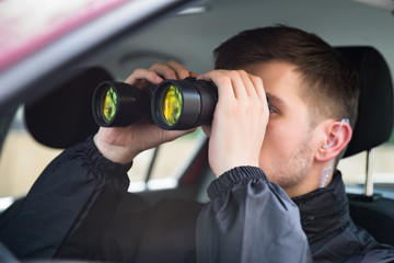 Close-up Of A Man Looking Through Binocular