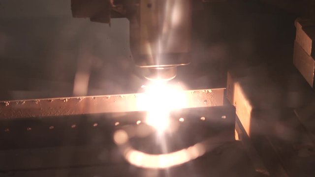 Sparks from CNC machine, close up slow motion