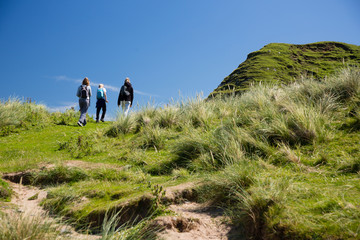 Northern Ireland coast landscape, hiking family 