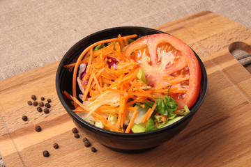 vegetable salad in plastic dish