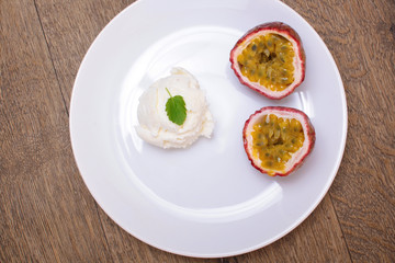 Milk ice cream with Passion fruit topping