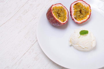 Milk ice cream with Passion fruit topping