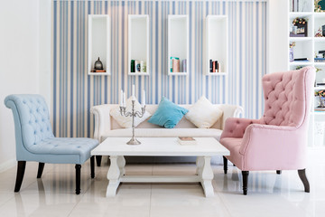 Lounge sofa and colorful pillow in lounge at living room in home.