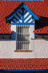 A window of one of the houses of the English Neighborhood “Victoria Queen " in Huelva, province of Spain