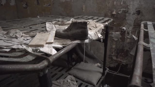 Abandoned decaying jail prison cell