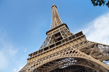 View of the Eiffel Tower in Paris. France. The Eiffel Tower was constructed from 1887-1889 as the entrance to the 1889 World's Fair by engineer Gustave Eiffel.