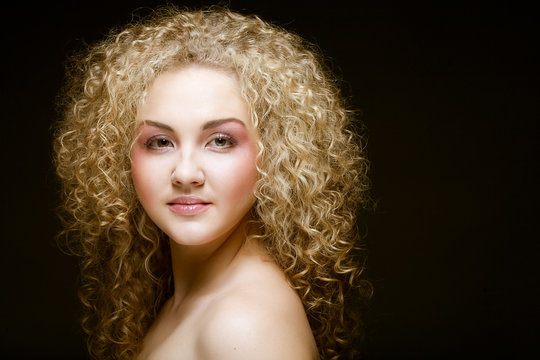 blonde with curly hair 