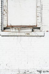 Boarded Up Window; Peeling White Paint