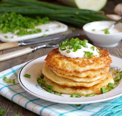 Fritters of zucchini. Zucchini Pancakes
