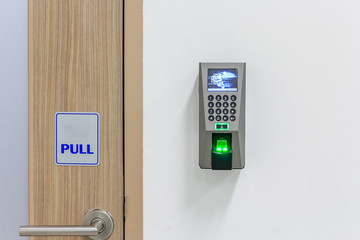 The fingerprint scanner control machine for record work time,fingerprint scanner on wall