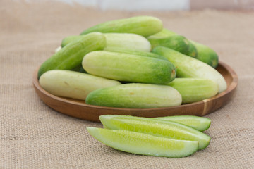 fresh cucumber on  sack