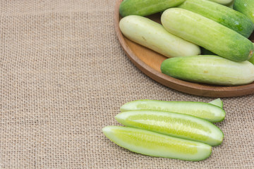 fresh cucumber on  sack