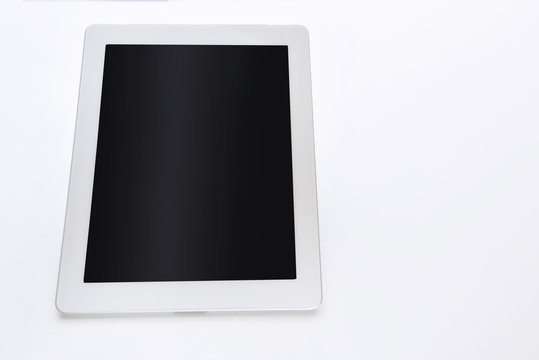 Perspective of white computer tablet isolated on white background, input text idea