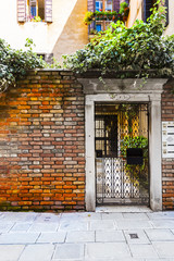 Fototapeta na wymiar Openwork gate in Venice