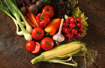Fresh vegetables on a wooden table. Healthy food. Diet