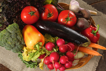 Fresh vegetables on a wooden table. Healthy food. Diet
