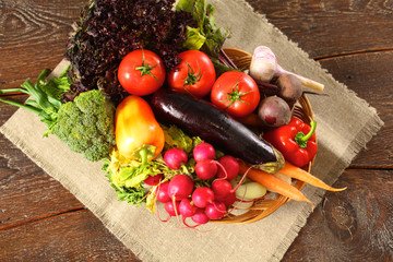 Fresh vegetables on a wooden table. Healthy food. Diet