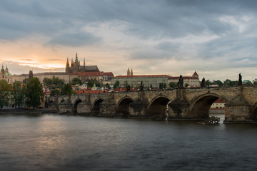 Fototapeta premium Prague Castle with cloudy sunset and Charles Bridge.