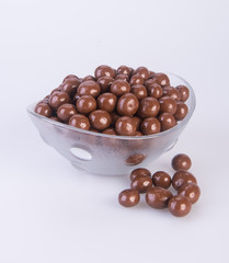 chocolate balls. chocolate balls in bowl on a background