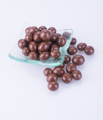 chocolate balls. chocolate balls in bowl on a background