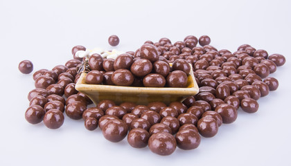 chocolate balls. chocolate balls in bowl on a background