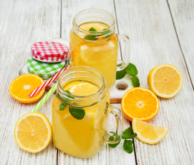 Obraz na płótnie Canvas Jars with lemonade
