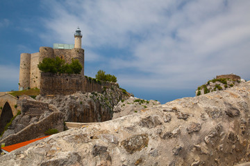 Detail of castle and lighthouse, Castro Urdiales, Cantabria, Spain