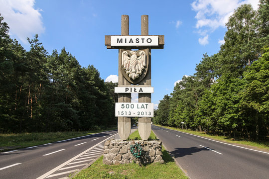 A monument marking the city of Pila, Poland
