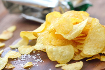 Potato chips on the table. Fast food.