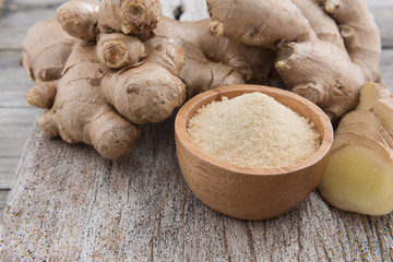 Fototapeta premium Fresh ginger root and ground ginger spice